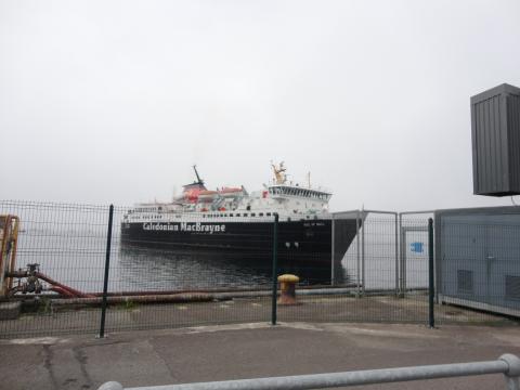 A large ferry boat that says "Caledonian MacBrayne" on the side. The boat's name on the bow reads "Isle of Mull".